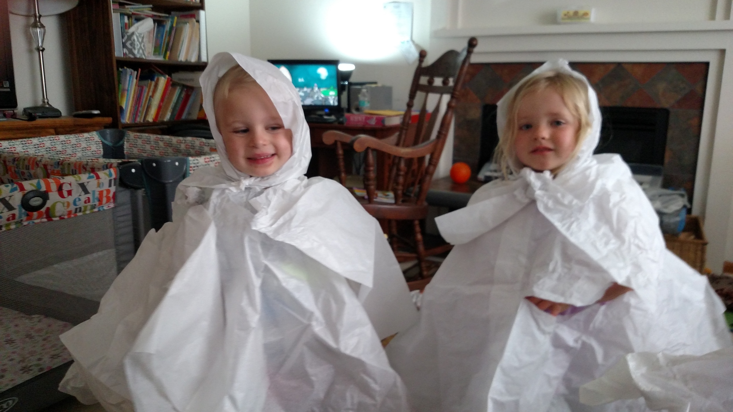Children participating in imaginative play indoors
